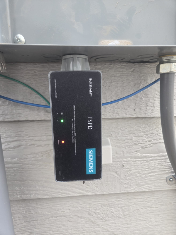 A whole house surge protector